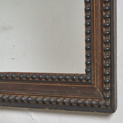 Miroir Napoleon III décor à frise de perles en bois